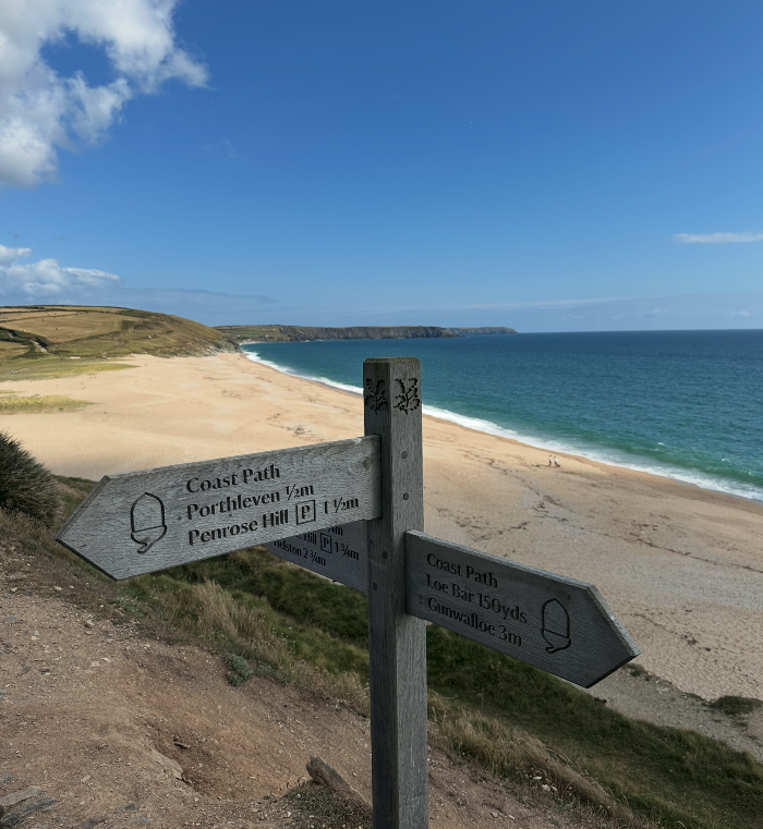 Coast path signpost above Loe Bar beach, near Helston, Cornwall